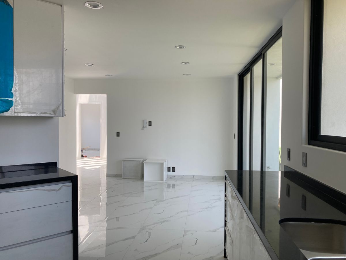 EN VENTA CASA EN BOSQUE REAL EN EL CAMPO DE GOLF DE 9 HOYOS