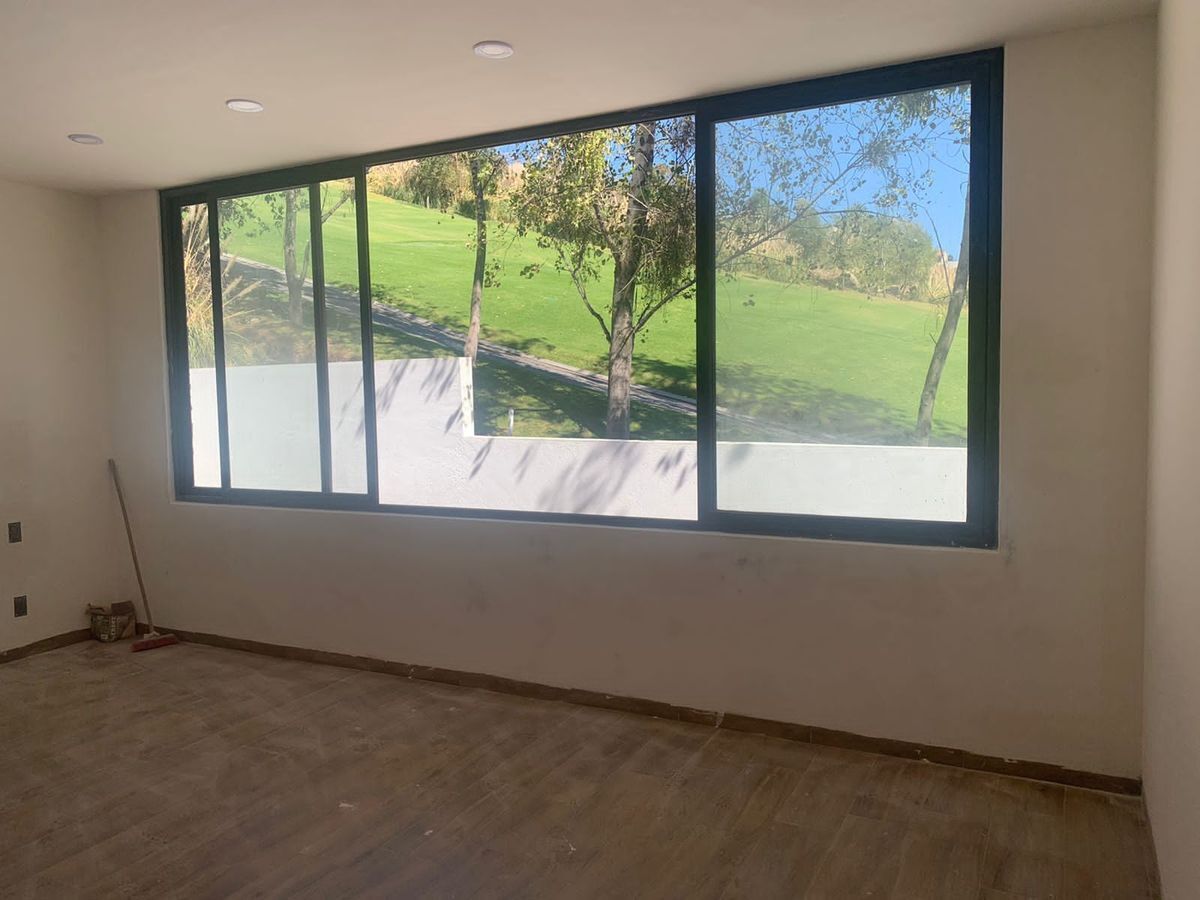 EN VENTA CASA EN BOSQUE REAL EN EL CAMPO DE GOLF DE 9 HOYOS