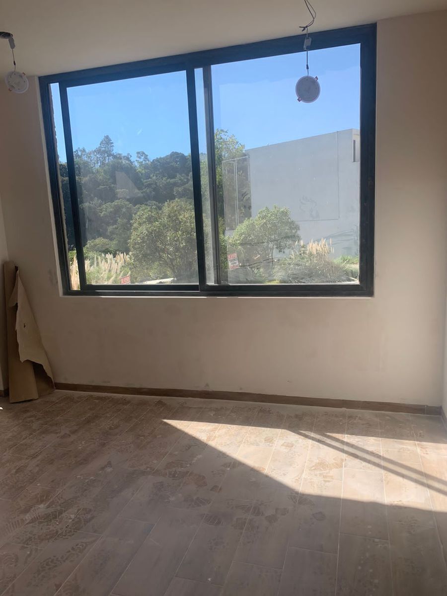 EN VENTA CASA EN BOSQUE REAL EN EL CAMPO DE GOLF DE 9 HOYOS