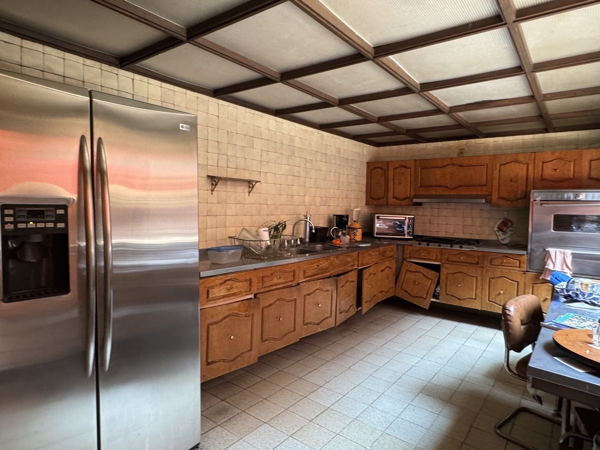 Casa para remodelar en calle arbolada en San Ángel Inn