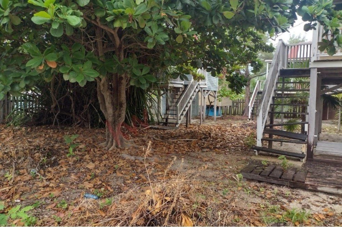 Terreno con cabañas a orilla de playa en Xcalak Quintana Roo