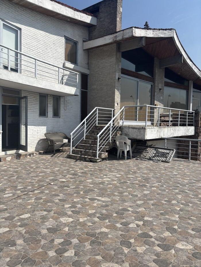 terreno con casa en lomas hipodromo en venta