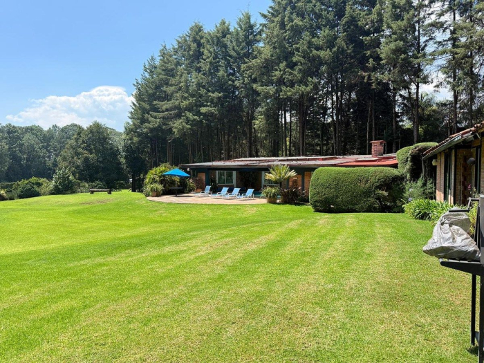 casa en renta con bosque, jardin y lago propio