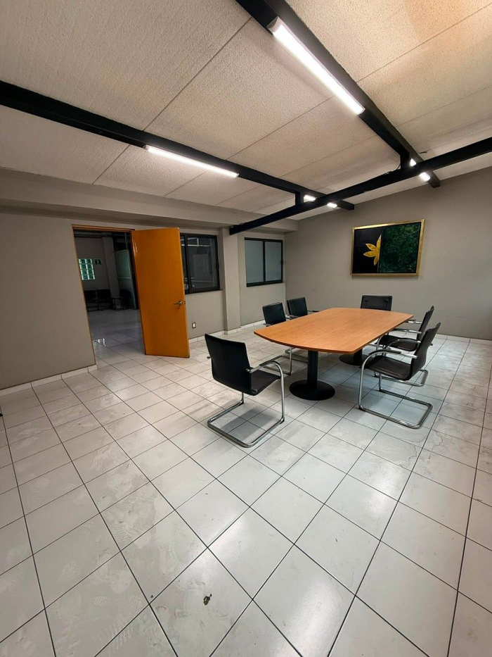 edificio corporativo con bodega independiente